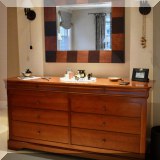 F42. Grange Cherry wood double dresser with 8 drawers. 33&rdquo;h x 65&rdquo;w 20&rdquo;d 